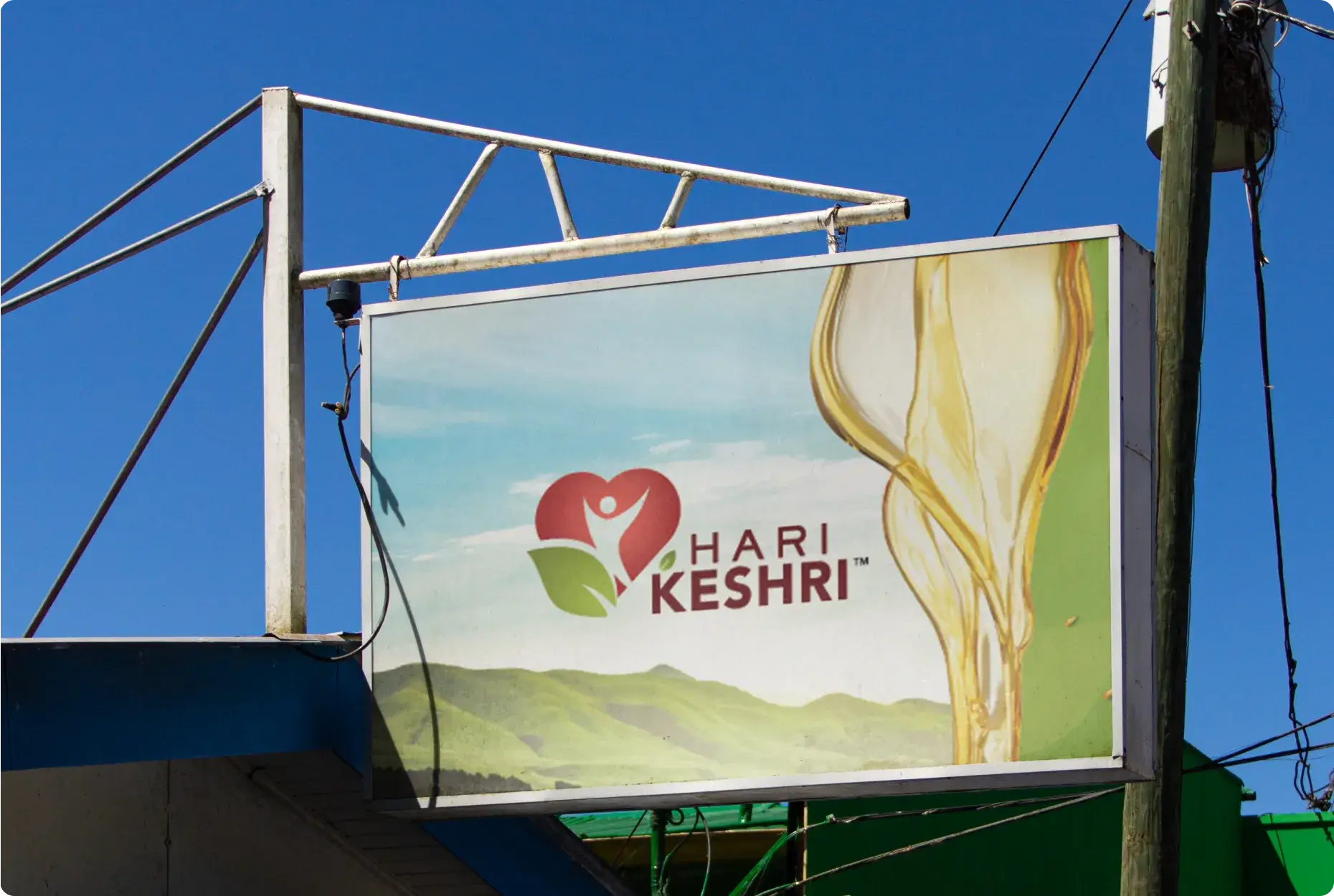Hari Keshri billboard featuring the logo.